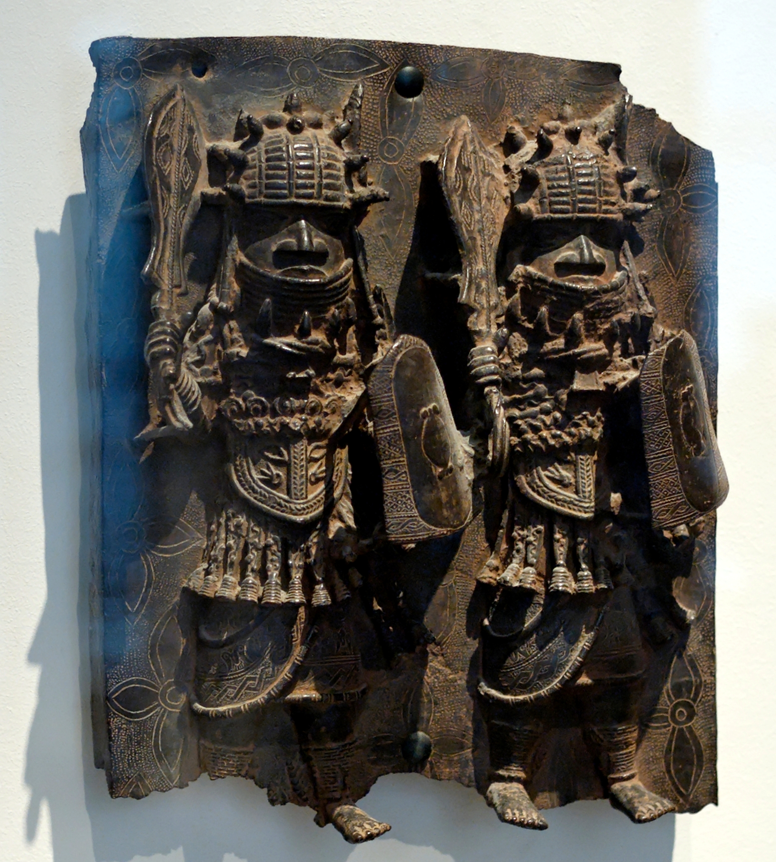 bronze sculpture of two warriors
