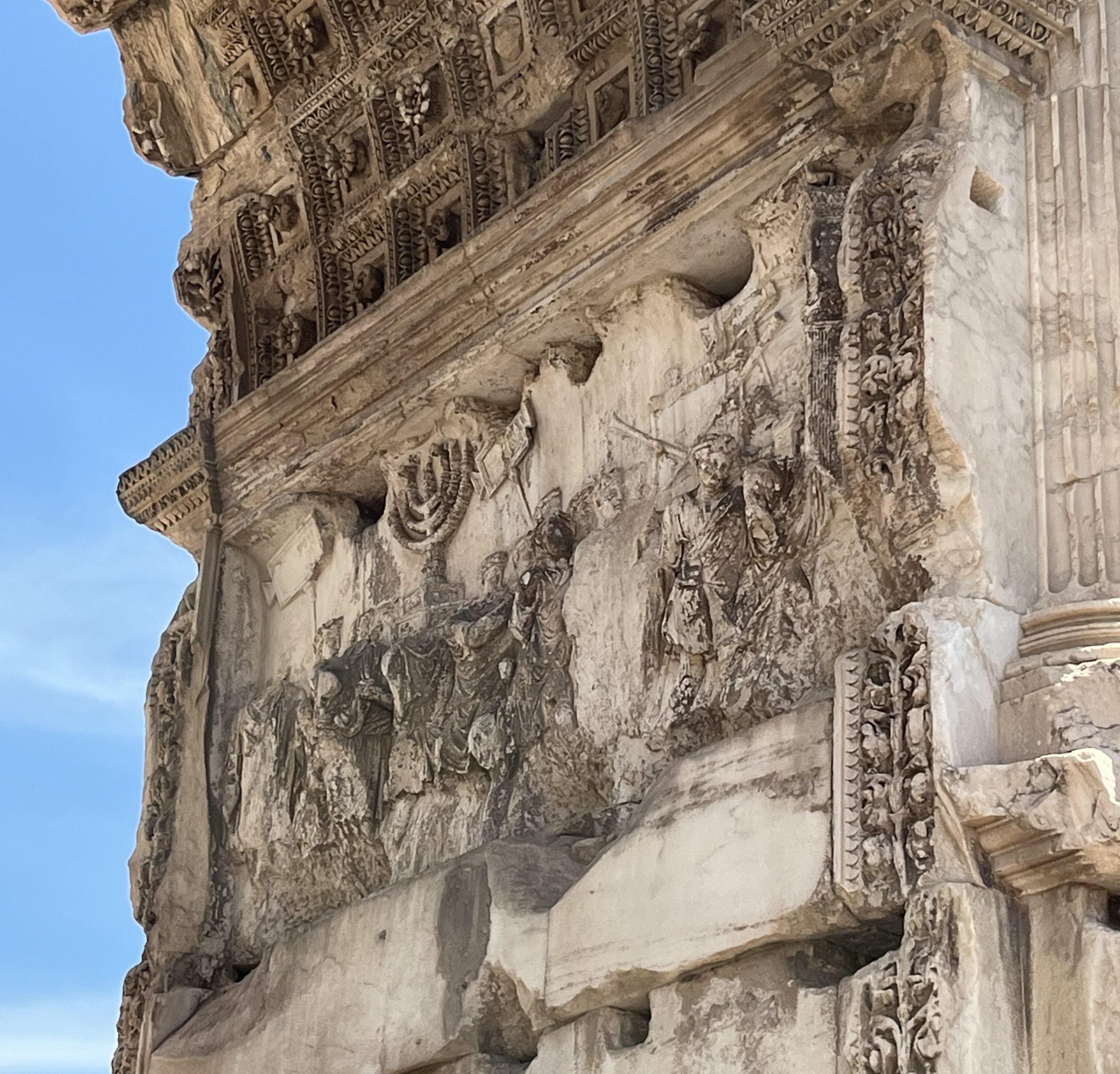 a detail from the triumphal Arch of Titus showing a Jewish menorrah.