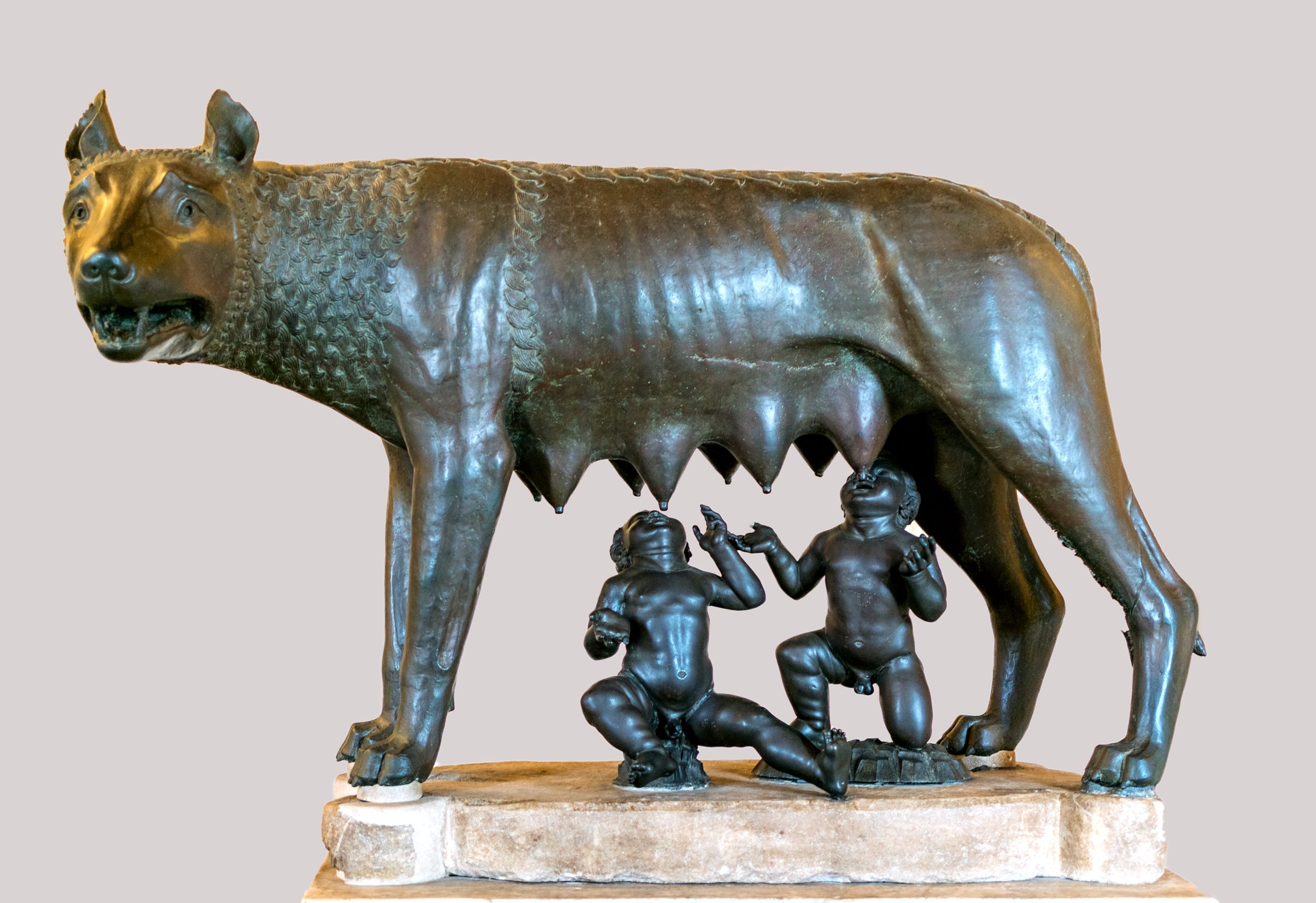 Bronze statue of a wolf suckling two twins.