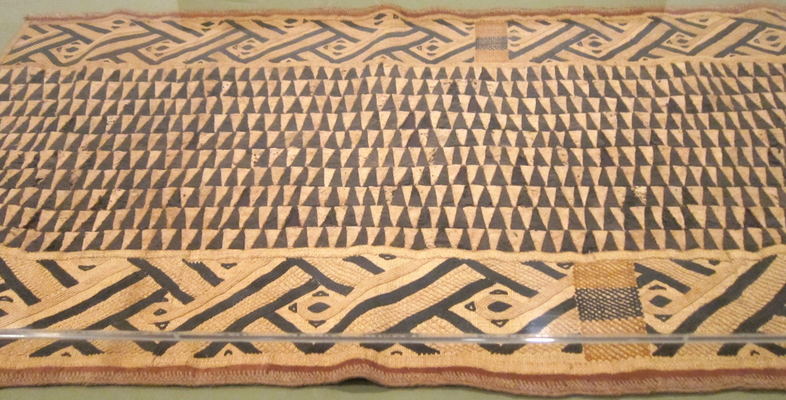 abstract pattern raffia women cloth, cream and black in color