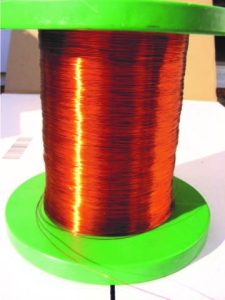 Copper wire is composed of many, many atoms of Cu. (credit: Emilian Robert Vicol)